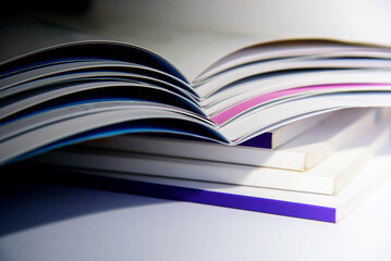 stack of open books on white background, isolated