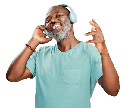 A joyous mature African American man wearing headphones and deeply involved in to the music. Smiling black man feeling free while expressing through dance isolated on a png background.