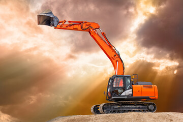 excavator is working and digging at construction site - obrazy, fototapety, plakaty