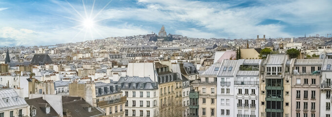 Paris, panorama of the city, with Montmartre and the Sacre-Choeur basilica in background
