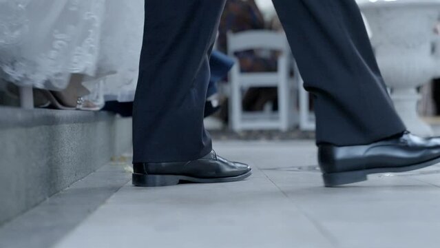 Bride's dress drags across the floor as she walks down stairs towards wedding ceremony location. Shot in 4K 60 FPS. To purchase entire event raw at wholesale price email willneatheryyahoo.com.