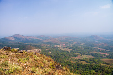 Fototapeta na wymiar beautiful view of Western ghats mountain range seen from Devarmane Peak, Karnataka, India.