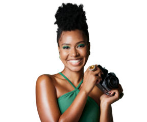 A modern happy black woman standing with a camera. An African creative female photographer from south africa isolated on a png background.