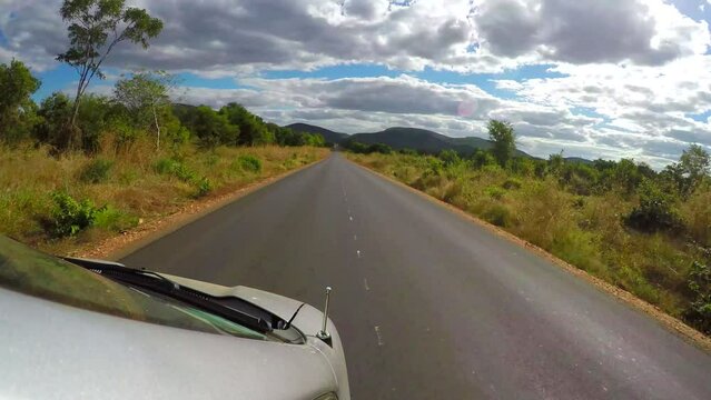 Cinematic hyperlapse shot of a car driving in africa