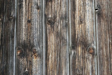 Alte graue Lattenholzwand mit Muster als Hintergrund