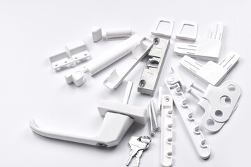 Fototapeta premium White plastic fittings for windows and doors isolated on white background