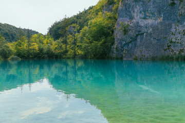 Cliffs and turquoise coloured water in Plitvice Lakes National Park, Croatia.