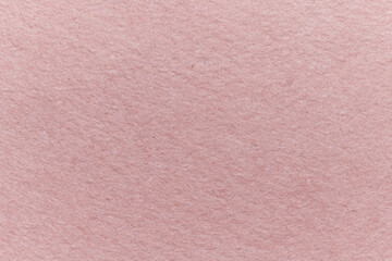 Soft felt textile material light brown colors, colorful texture flap fabric background closeup