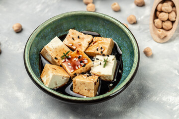 tofu marinated in bowl. traditional chinese dish. Food recipe background. Close up