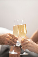 Couple toasting champagne glasses