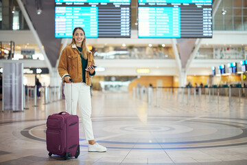 Woman, airport and luggage for travel, vacation or journey in schedule flight with passport in Cape Town. Portrait of happy female traveler standing ready for departure, boarding plane or immigration - obrazy, fototapety, plakaty