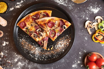 slices of pizza with toppings and flour around