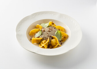 ravioli with meat in sauce