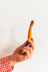 rotten moldy carrots hands of man