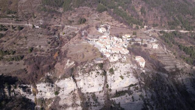 Village of Le Mas in the french alps filmed from a drone