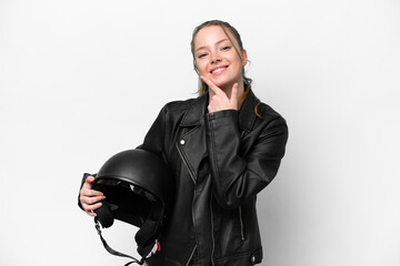 Young caucasian girl with a motorcycle helmet isolated on white background happy and smiling