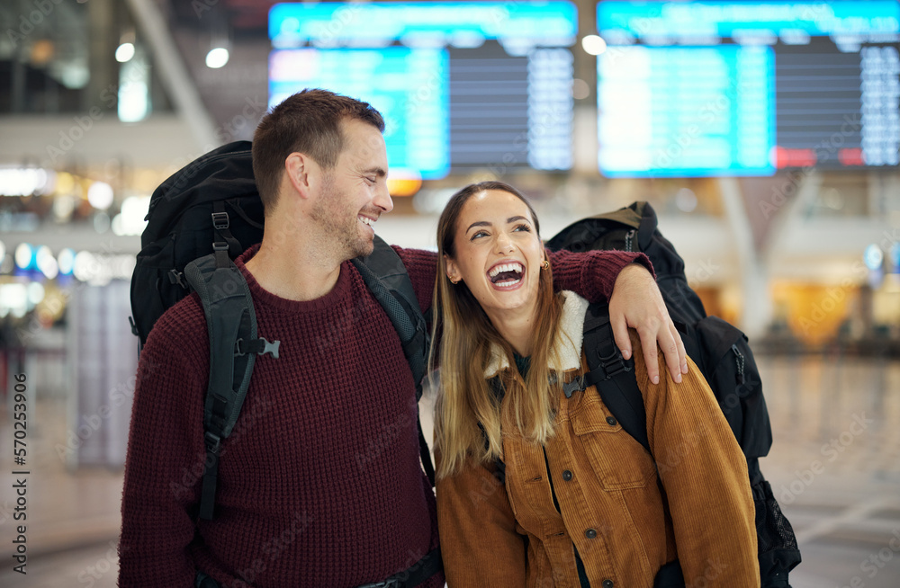 Canvas Prints Travel, hug and couple at airport talking, chatting or laughing at comic or funny joke. Valentines love, thinking and happy man and woman in airline lobby waiting for flight departure for vacation.