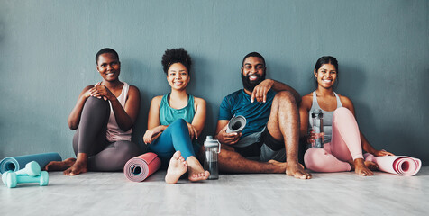 Yoga, fitness portrait and black people happy at pilates class in gym with a exercise and training break. Lounge, wellness and peace of friends on floor ready for zen, balance and relax by wall