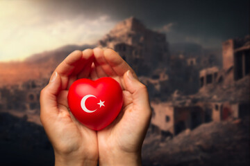 female hands hold and giving red heart in the form of a Turkey flag, support concept