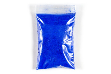 Package with blue powder paint on a white background.