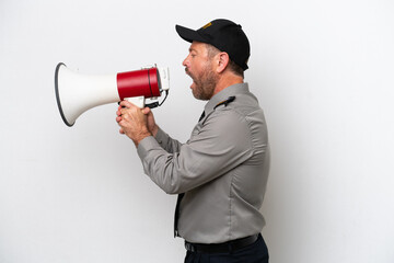 Fototapeta premium Middle age security man isolated on white background shouting through a megaphone