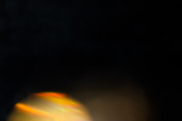 Blur colorful rainbow crystal light leaks on black background. Defocused abstract multicolored retro film lens flare bokeh analog photo overlay or screen filter effect. Glow Vintage prism colors