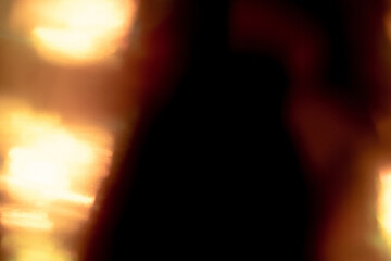 Blur colorful rainbow crystal light leaks on black background. Defocused abstract multicolored retro film lens flare bokeh analog photo overlay or screen filter effect. Glow Vintage prism colors