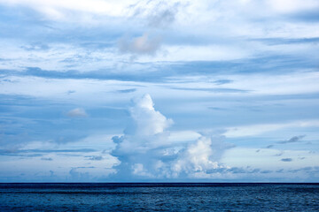 Beautiful clouds sunset light on blue sky with pink hues in asia on Bali island