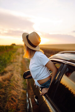 Towards Adventure! Young Woman Is Resting And Enjoying The Trip In The Car. Lifestyle, Travel, Tourism, Nature, Active Life.