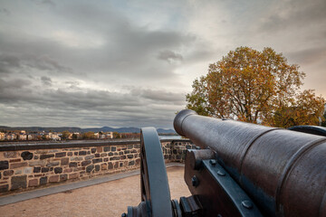Picture of the old cannon on the alter zoll am rhein in Bonn, overlooking the rhine river. The Alter Zoll, or old customs, is part of the park on the Bonn fortifications of dreikoningen.