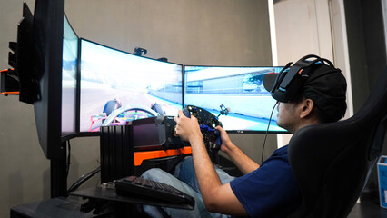 professional gamer playing online car racing © A Denny Syahputra