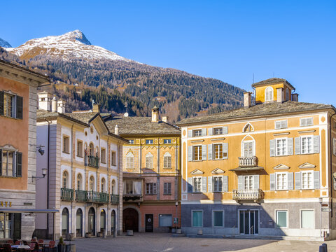 Poschiavo, Switzerland - January 19, 2022: Historical square and houses of the old town of Poschiavo, municipality in the canton of Graubunden, Grisons.