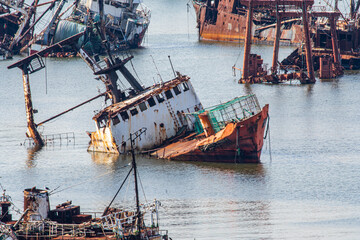 Abandoneold rusty ships in the Port of Montevideo, Uruguay. Old ship grave yard.