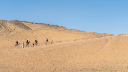 Obraz na płótnie Canvas A view of the sand dunes on the east bank of Aswan, Egypt. 