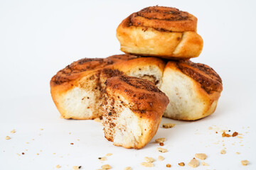Salty bread with walnut poppy sesame isolated on white background. It is called lokum locally in turkey.