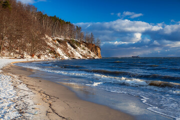 Beautiful landscape of the cliff in Gdynia Orłowo in snowy winter, Baltic Sea. Poland