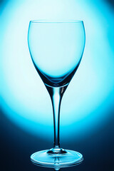 glass of water on blue