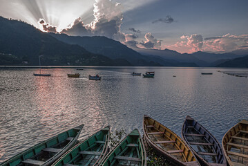 Fototapeta premium Boats on Phewa Lake at sunset, Pokhara, Nepal