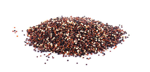 Quinoa seeds isolated on white background. Mix of white, red and black quinoa.