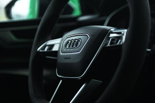Belarus, Minsk - 24.01.2023: Interior of a premium car Audi RS 7 Sportback steering wheel and dashboard. Audi RS7 Sportback.