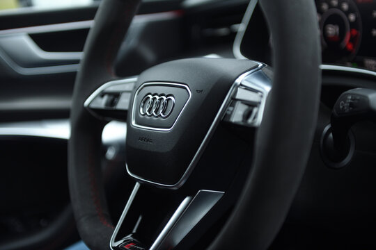 Belarus, Minsk - 24.01.2023: Interior of a premium car Audi RS 7 Sportback steering wheel and dashboard. Audi RS7 Sportback.