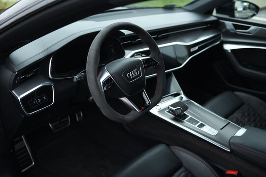 Belarus, Minsk - 24.01.2023: Interior of a premium car Audi RS 7 Sportback steering wheel and dashboard. Audi RS7 Sportback.