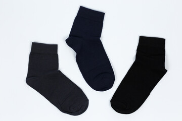 Socks on a white background. Socks on the leg.