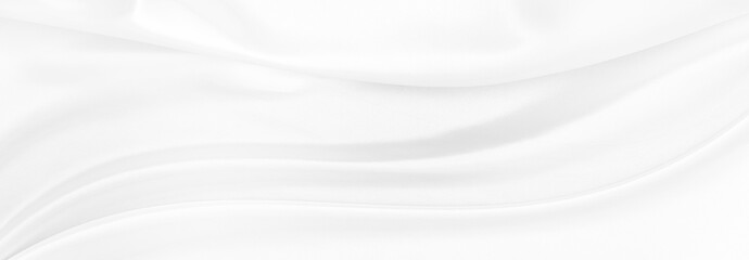 White gray satin texture that is white silver fabric silk panorama background with beautiful soft blur pattern natural.