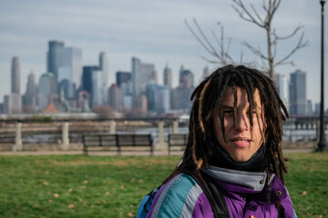 portrait of a person with dreadlocks