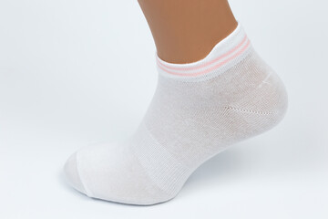 Socks on a white background. Socks on the leg.