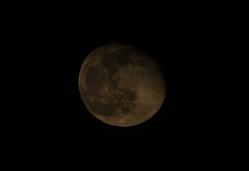 The moonset of the waning moon is a breathtaking sight, as the silver orb dips below the horizon, painting the sky with a warm golden hue