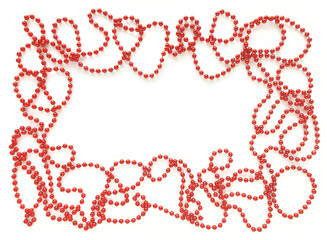 Red beads around like frame on white background. Empty space for text in the middle. Flat lay for Valentines Day or holidays.