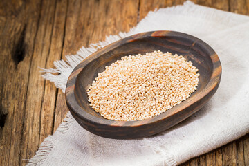 quinoa grains in container, healthy cereal, close-up image