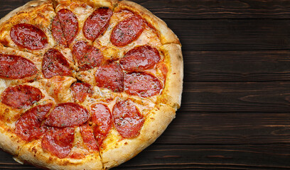 baked pizza with sausage, cheese and spices